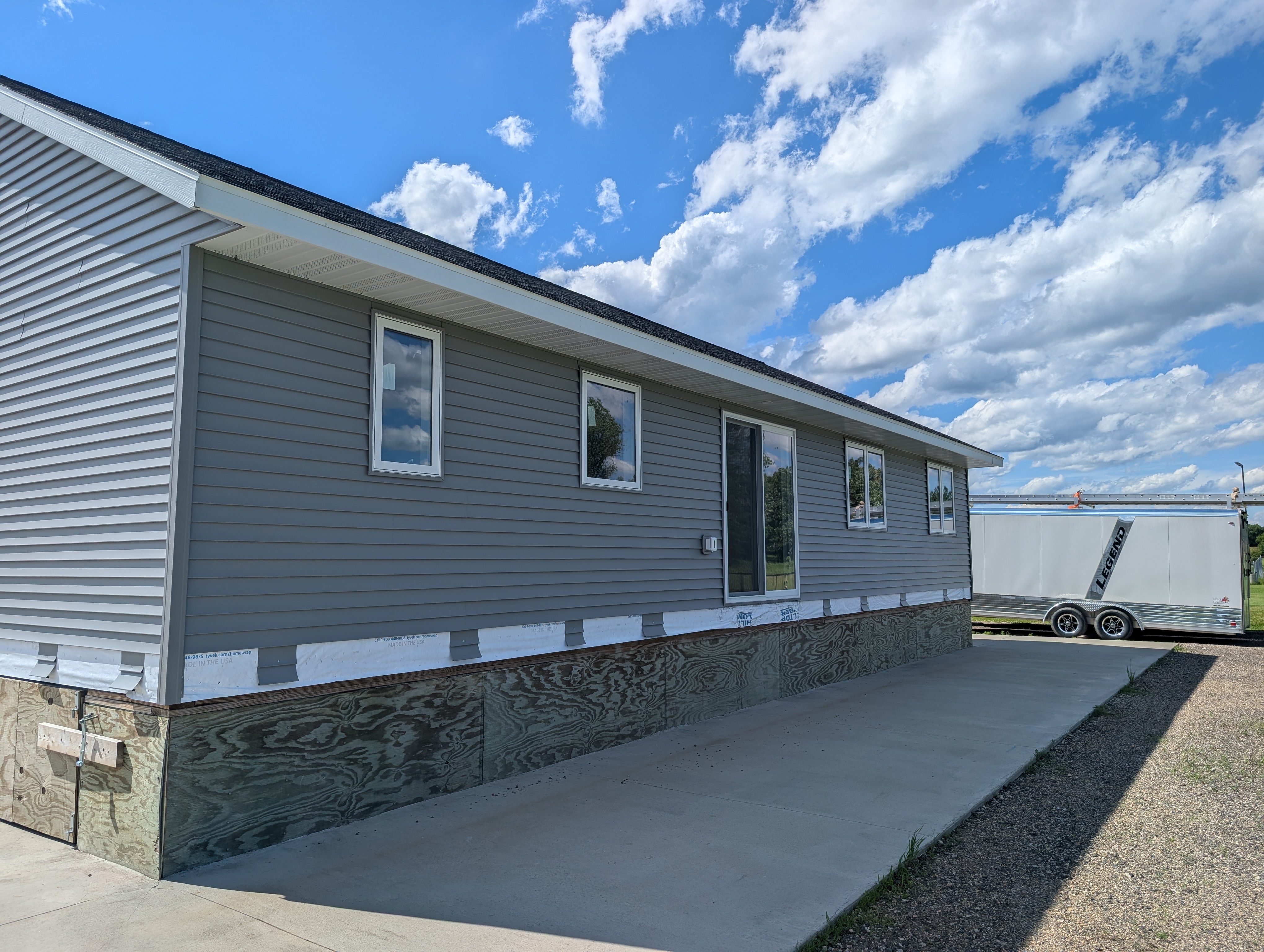 Rear of house with sliding patio door.