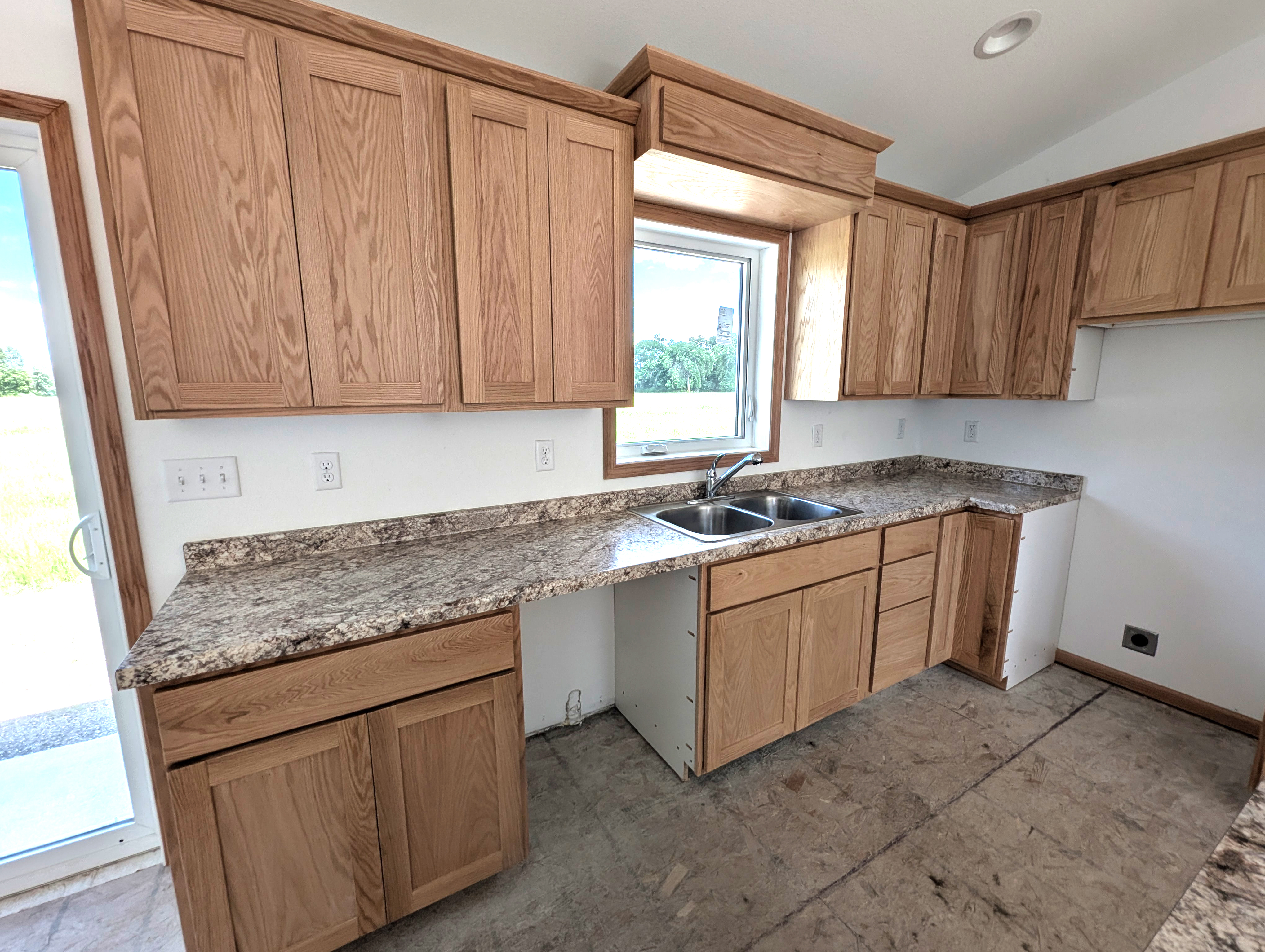Custom cabinetry in kitchen was built by Carpentry program students.