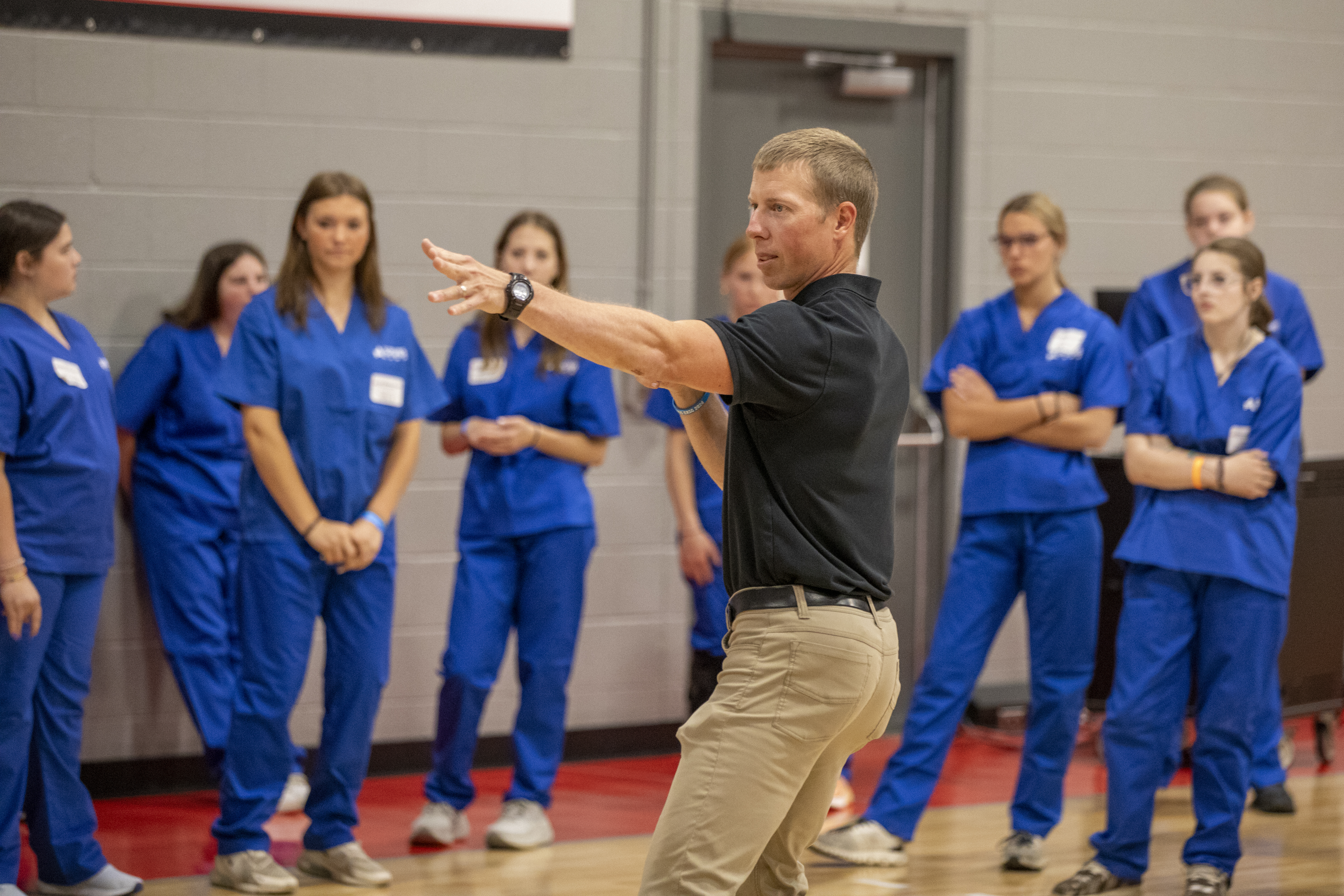 Students listening to an instructor