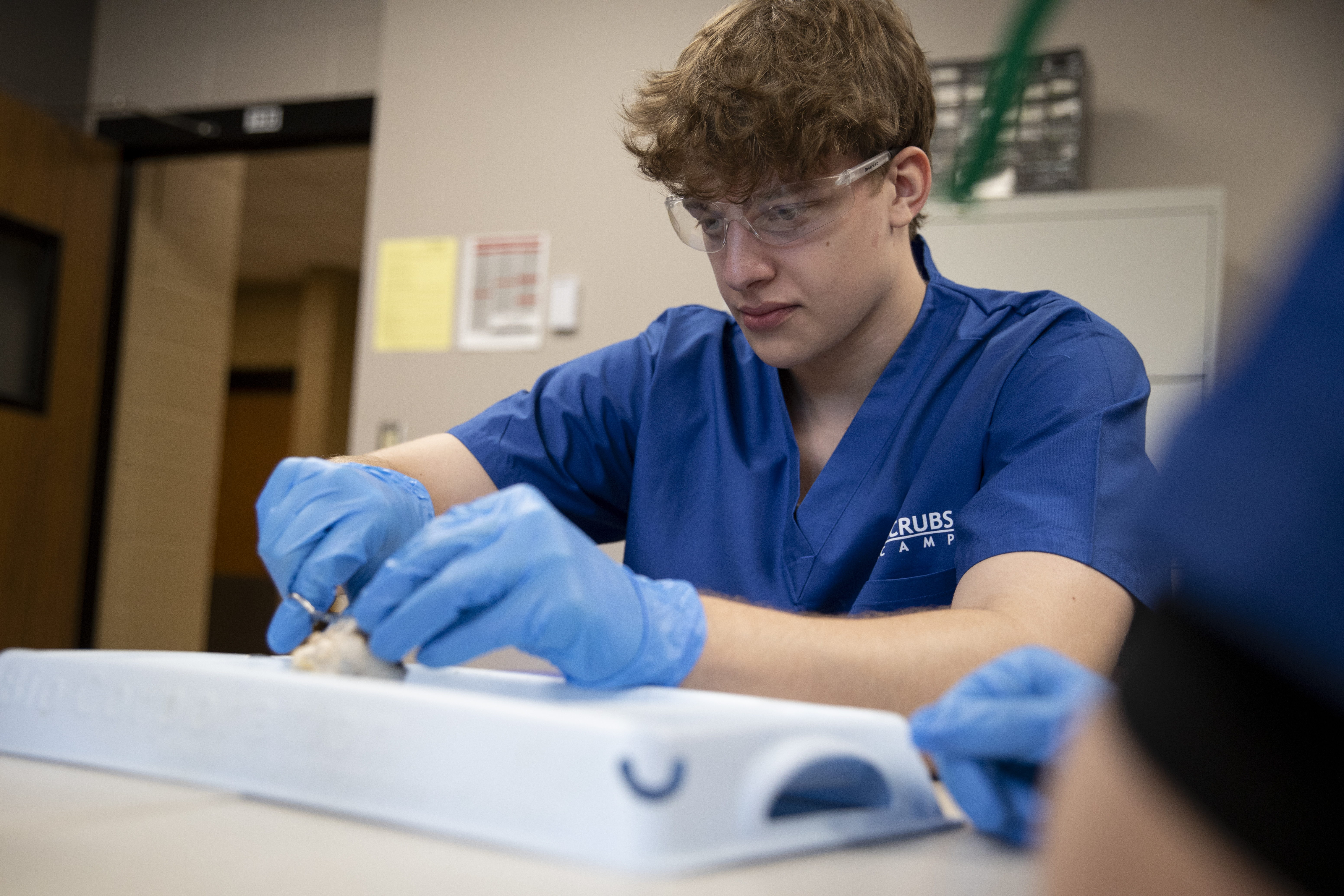 Student focusing on a project