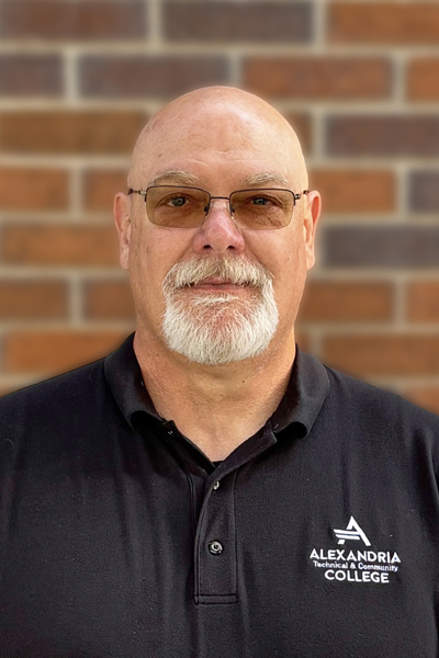 Ron Schwint Headshot of Ron Schwint wearing black shirt