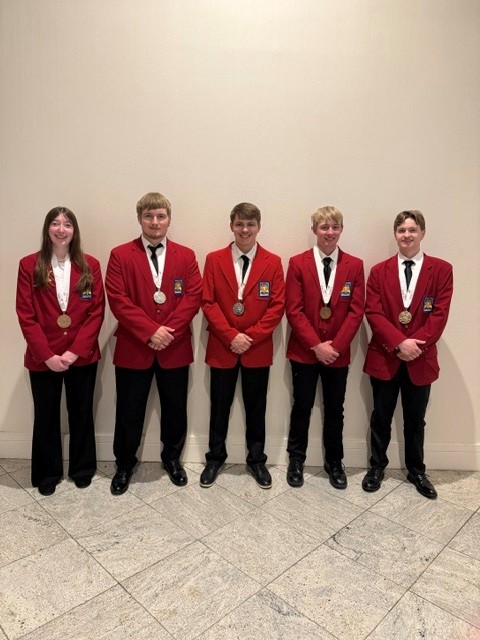 Five ATCC SkillsUSA students wearing red SkillsUSA jackets stand side by side with medals earned at the 2026 SkillsUSA National Leadership & Skills Conference in Atlanta
