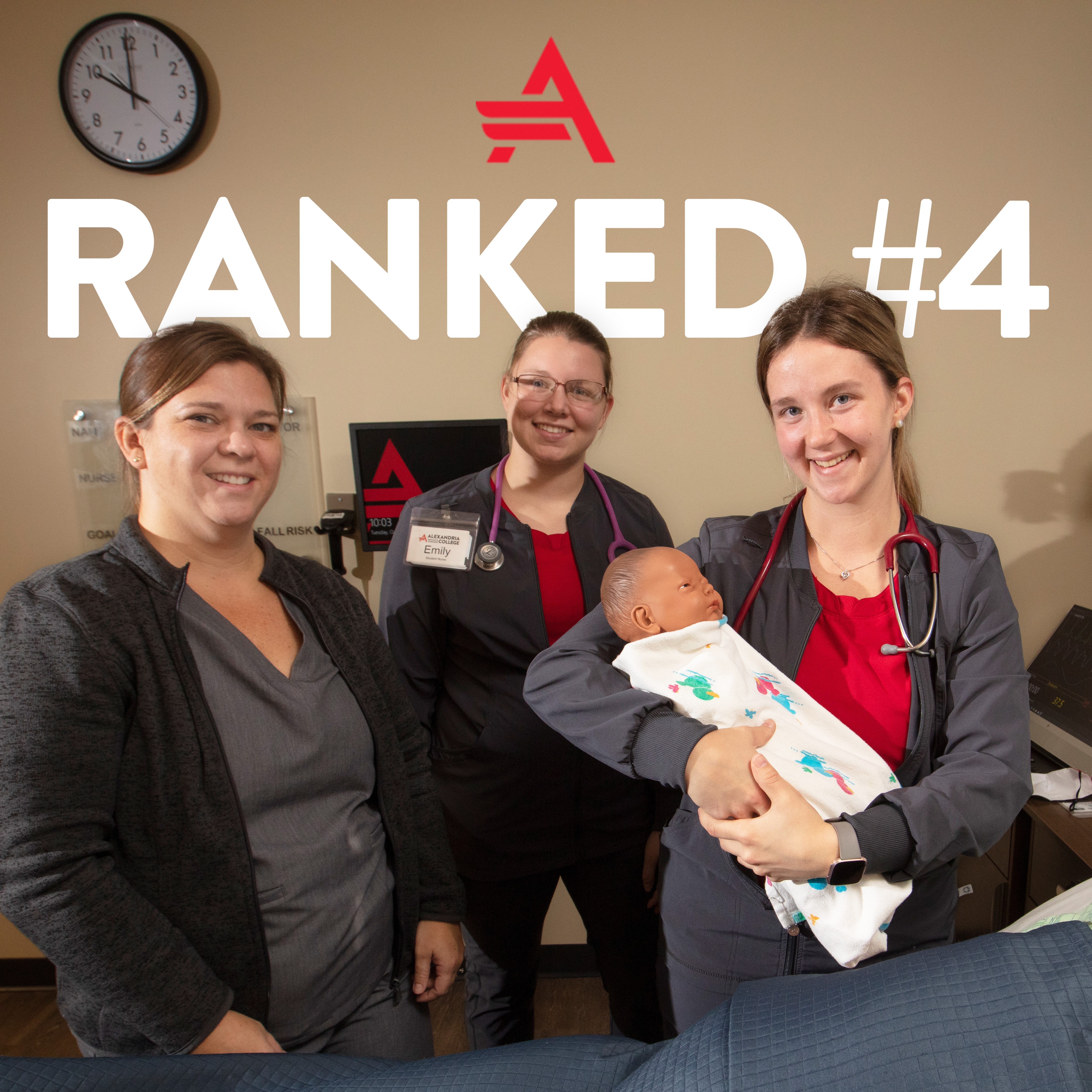 Nursing students holding mannequin baby in nursing program