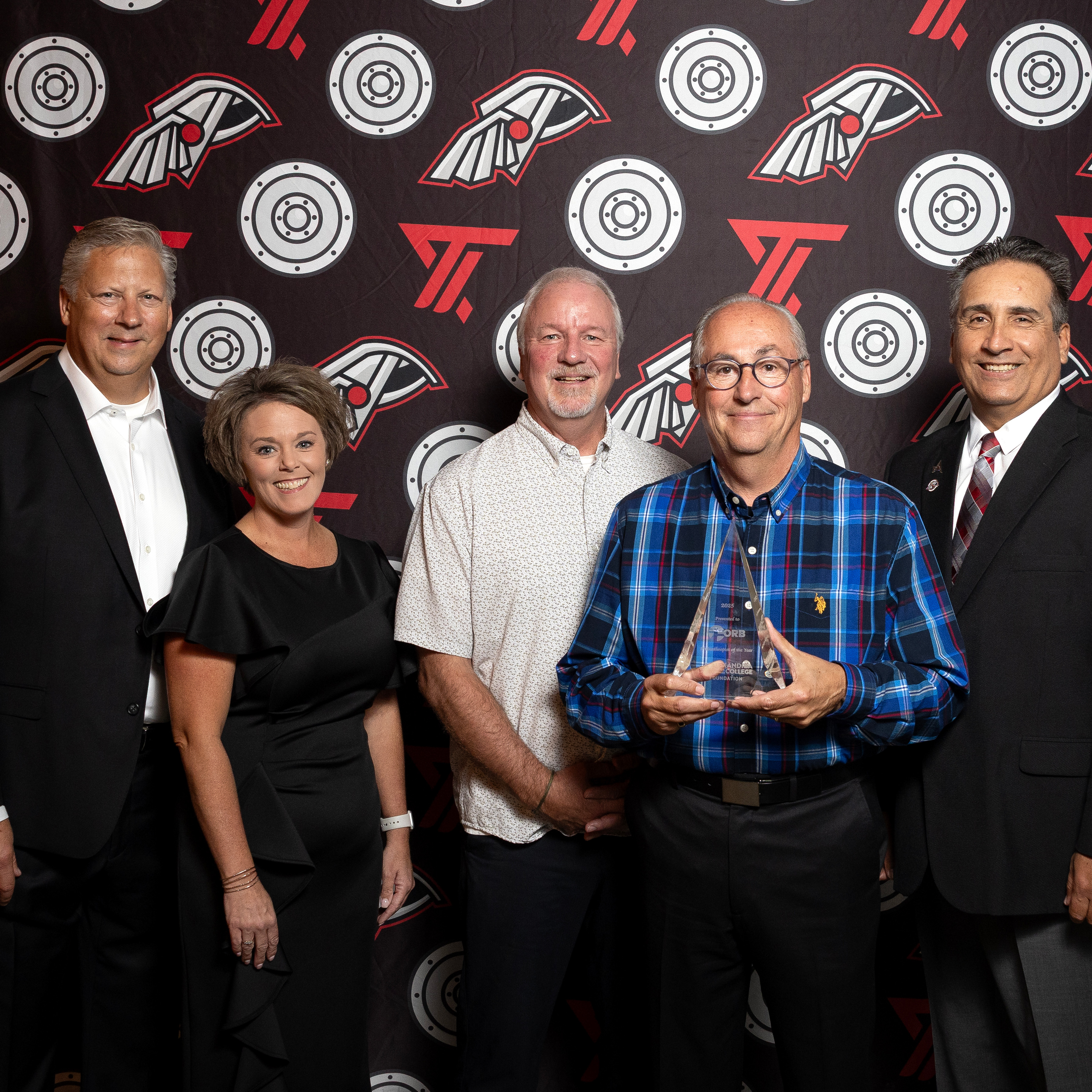 Pictured in photo: Jeff Wild, Christine Harris, Tom Wacholz, Kim Barse, Michael Seymore