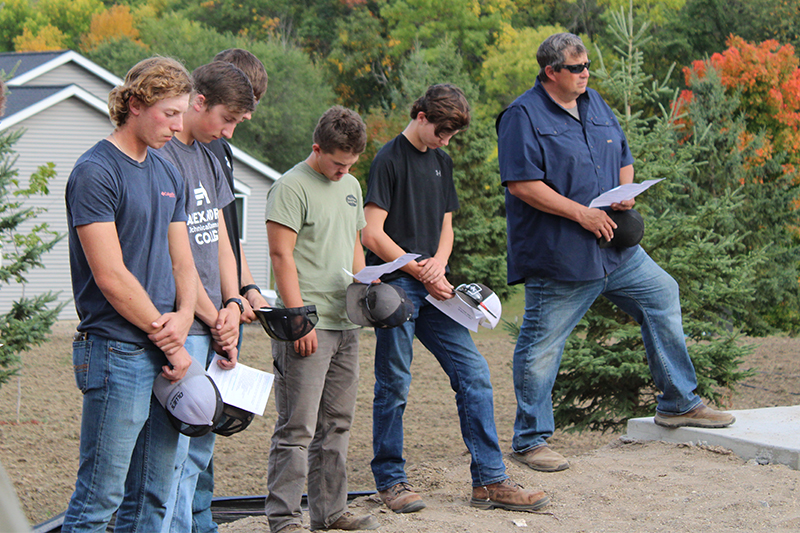 ATCC Carpentry students and faculty bless the Legends Build home while partnering with Habitat for Humanity of Douglas County.