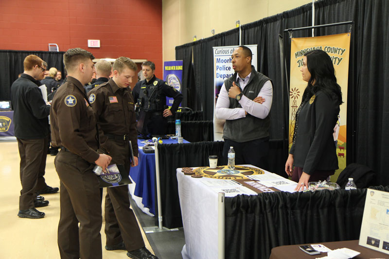 Students speak with Moorhead PD representatives