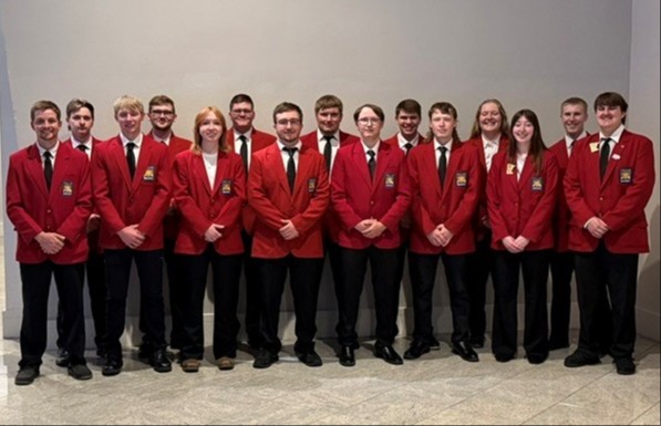Fifteen ATCC SkillsUSA students wearing red SkillsUSA jackets pose together at the 2026 SkillsUSA National Leadership & Skills Conference in Atlanta.