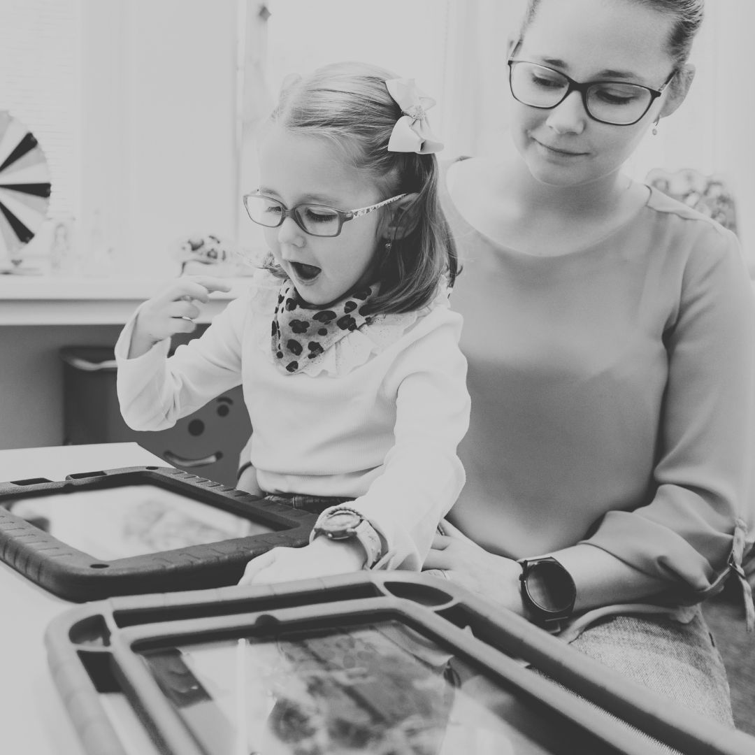 Speech Language Therapist working with young child