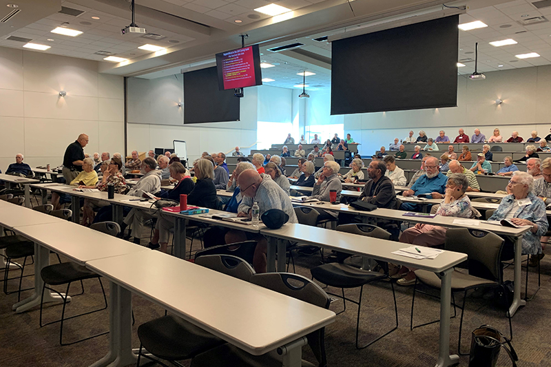 A class of attendees of the Senior College Fall 2023 session learn from college level educators.