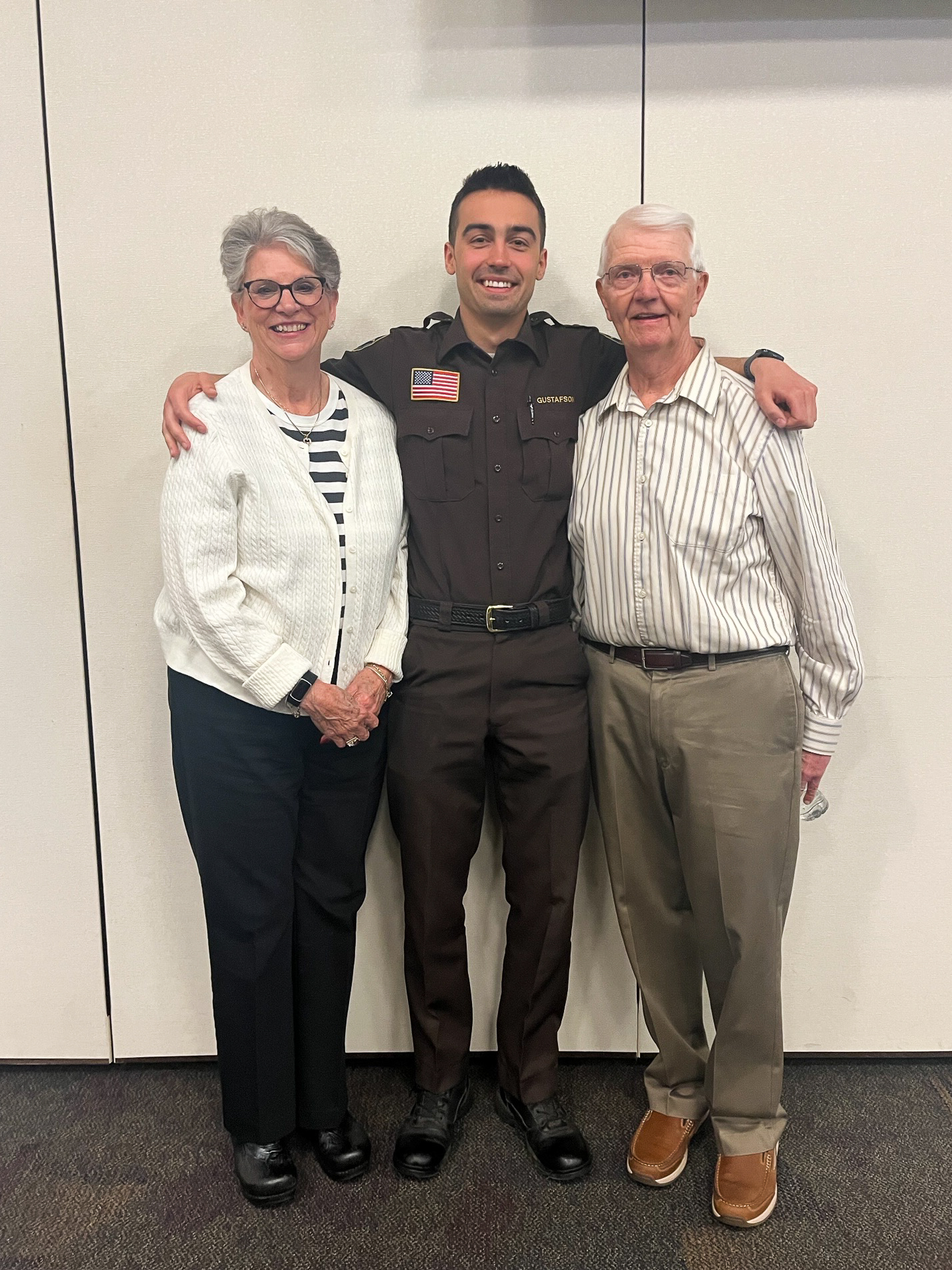 Mr. and Mrs. Thomsen with Scholarship winner Nolan Gustafson