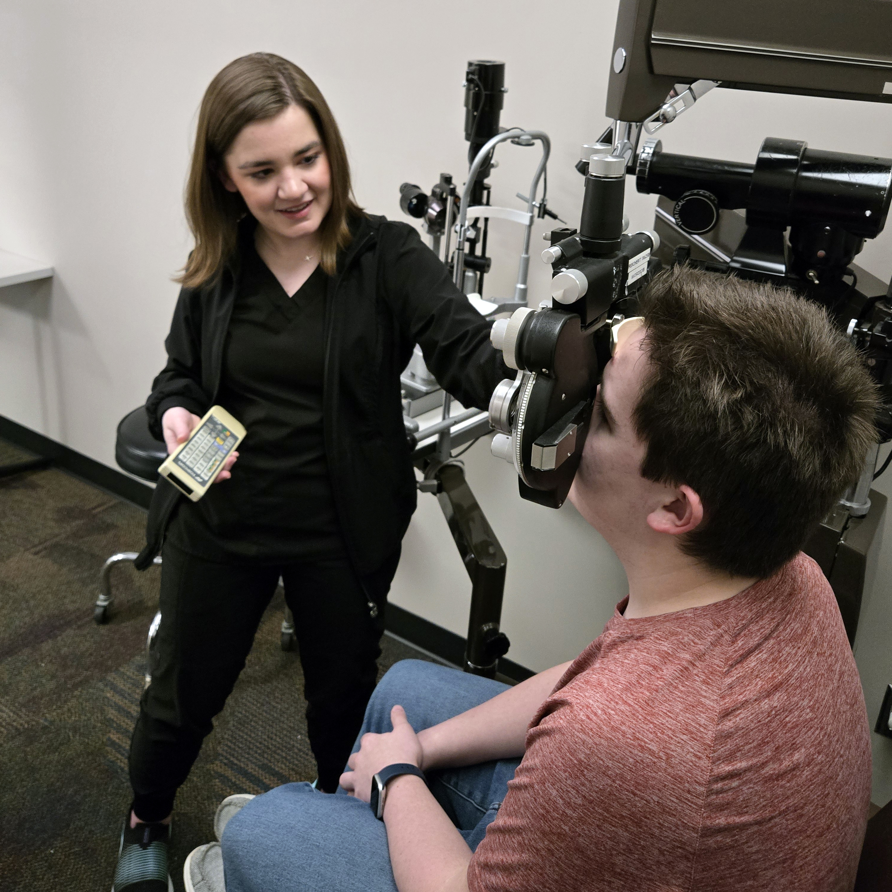Ophthalmic Technician Performing Eye Exam