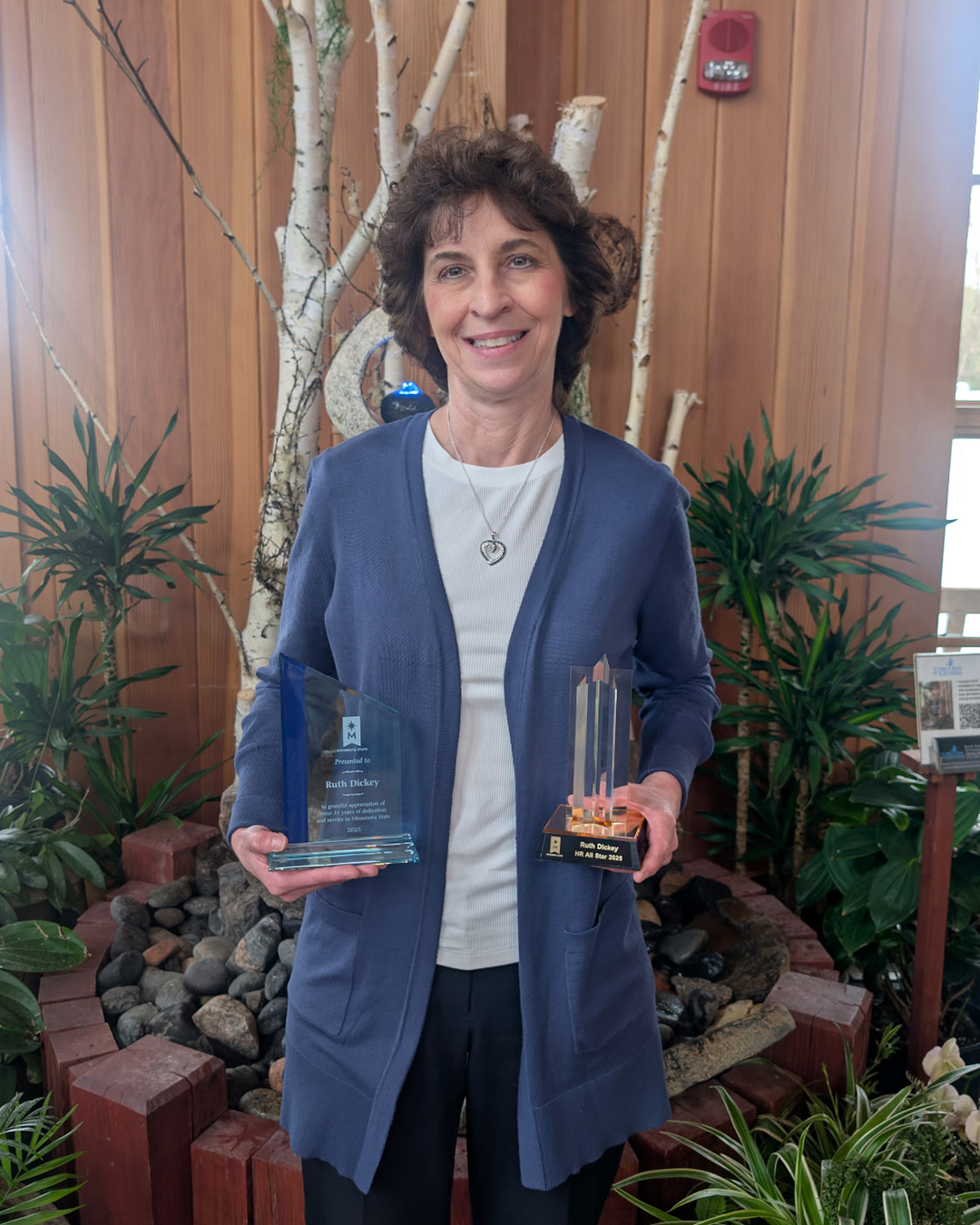 Ruth Dickey Holding 2 HR Awards